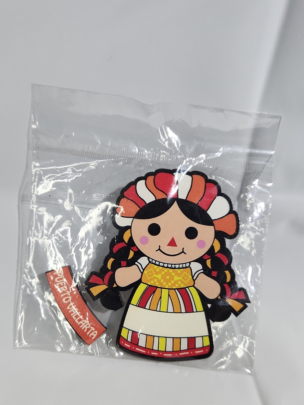 Wooden Mexican María doll (Lelé doll) fridge magnet from Puerto Vallarta, Mexico